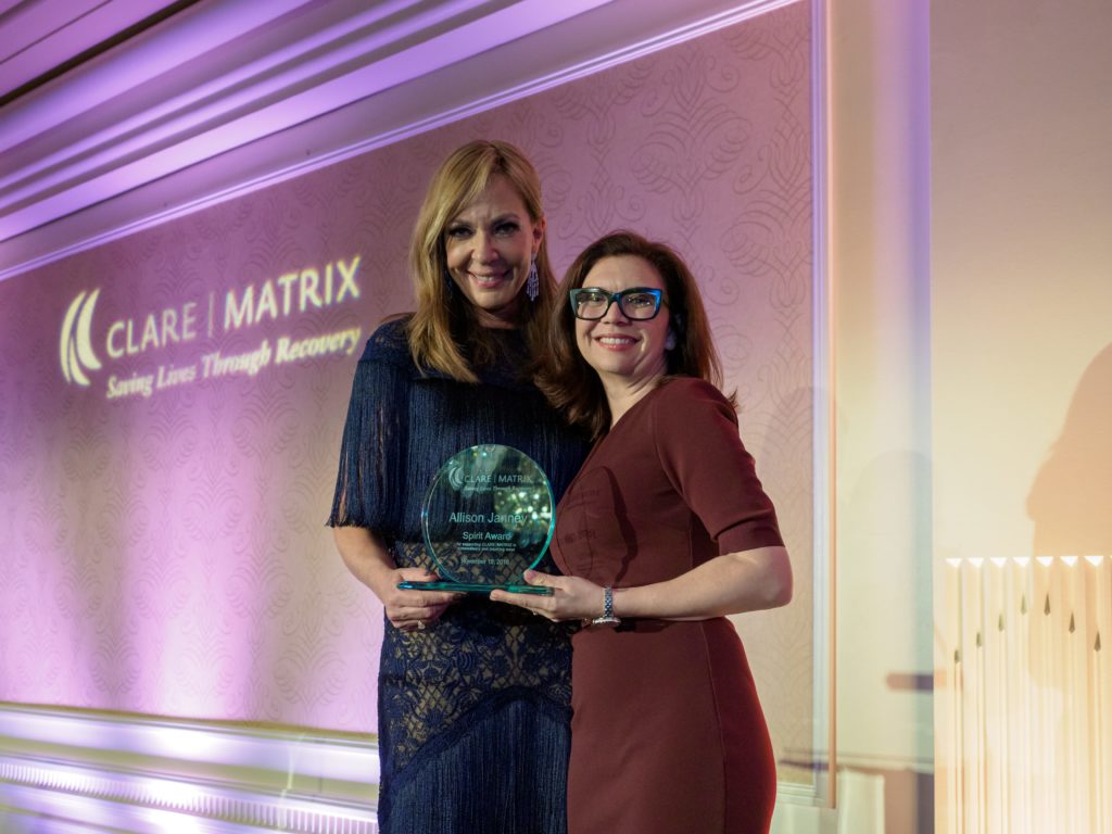 women holding award after the CLAREMATRIX tribute dinner